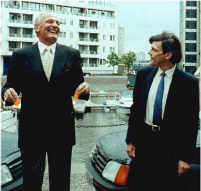 Henry Cooper presenting me with two goldfish.