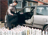 Me with car surrounded by Fairy Liquid bottles for an estimate comp.
