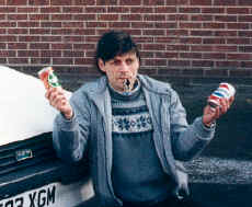 Me with car keys in mouth and cans in hands